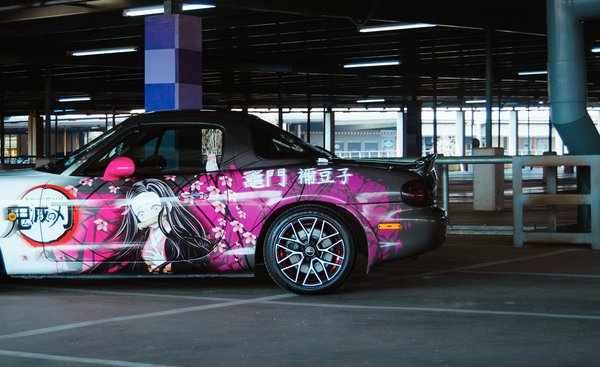 Quels sont les avantages d'installer un déflecteur de vent sur une voiture décapotable comme la Mazda MX-5?